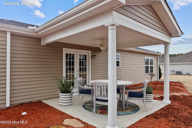 view of patio featuring central AC unit, french doors, and ceiling fan