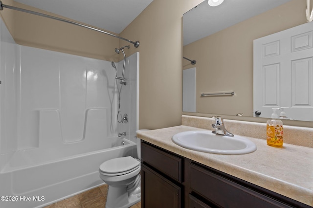 full bathroom with toilet, vanity, and bathing tub / shower combination