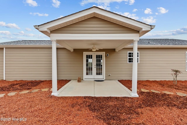 back of house featuring french doors, a shingled roof, a ceiling fan, and a patio area