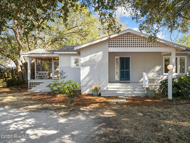 view of front facade featuring crawl space and covered porch