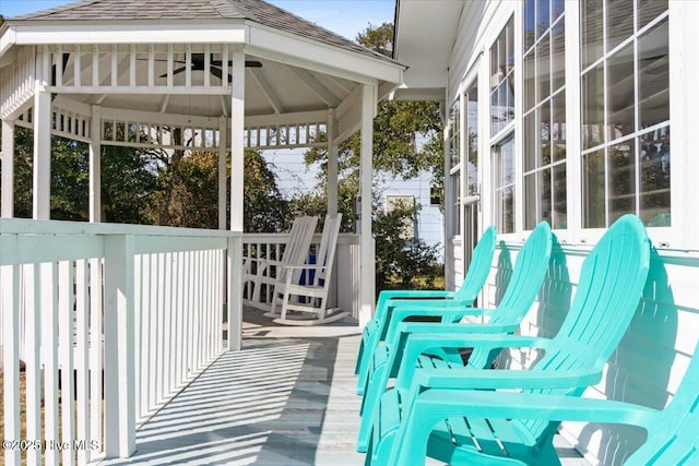 wooden deck with a gazebo