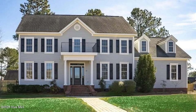 111 Wingate Dr, New Bern, NC 28562 - colonial home featuring a front yard and a balcony