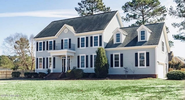 111 Wingate Dr, New Bern, NC 28562 - colonial home featuring fence, a front lawn, and a balcony