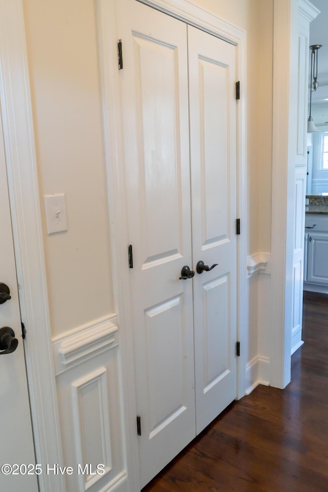 111 Wingate Dr, New Bern, NC 28562 - details with a decorative wall, a wainscoted wall, and wood finished floors