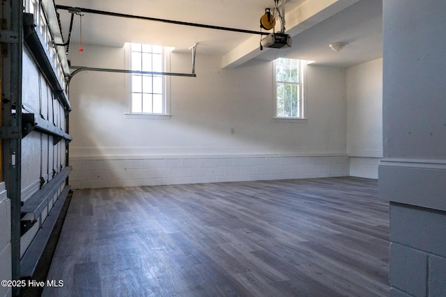 unfurnished room with wood finished floors