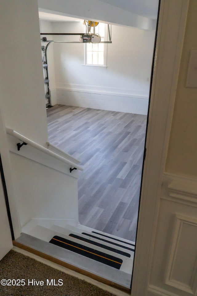 111 Wingate Dr, New Bern, NC 28562 - staircase featuring a notable chandelier and wood finished floors