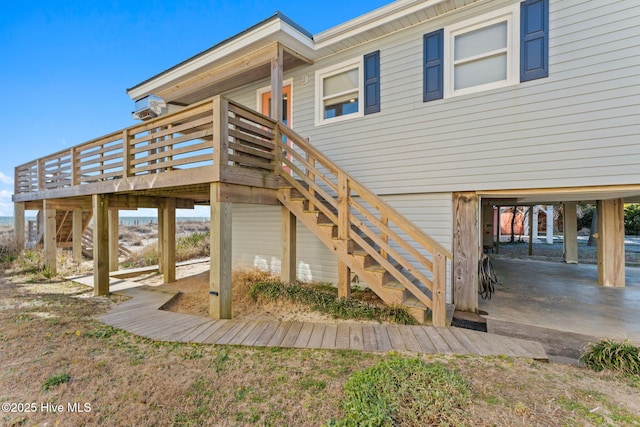 exterior space with stairs and a deck