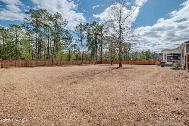 view of yard featuring a fenced backyard