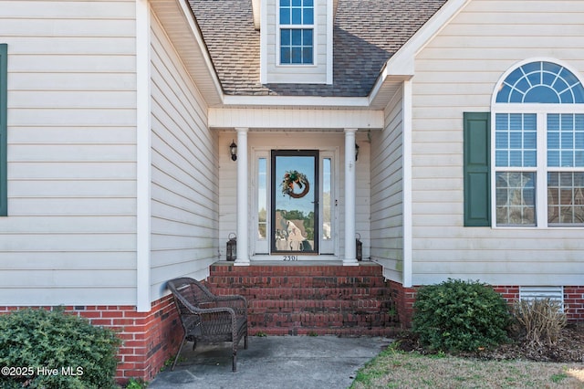 doorway to property with crawl space and roof with shingles