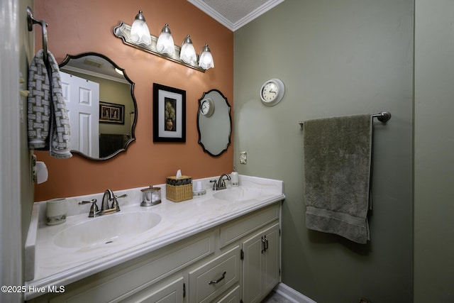 full bathroom featuring double vanity, crown molding, and a sink