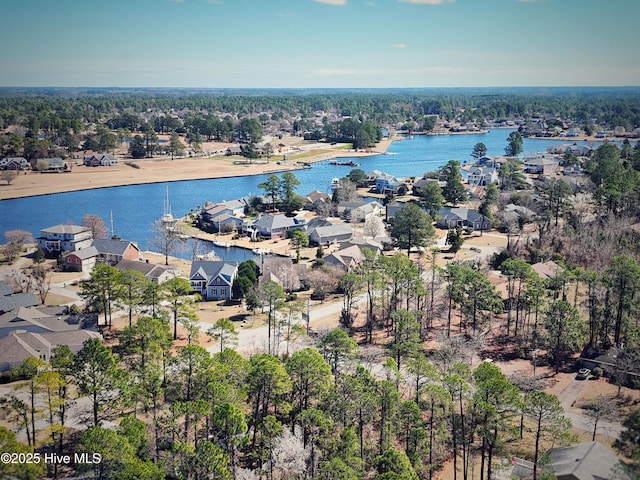 bird's eye view with a residential view and a water view