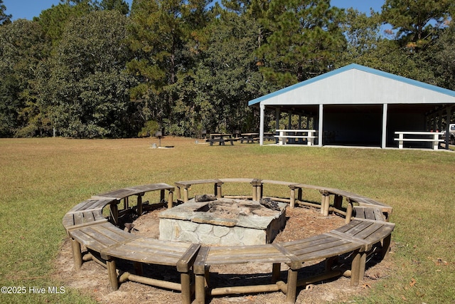 view of yard featuring a fire pit