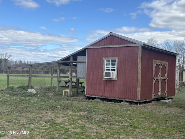 view of outbuilding featuring an outdoor structure and cooling unit