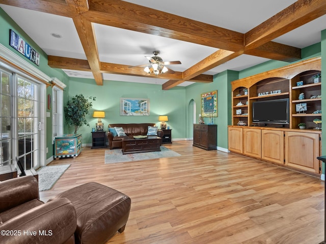 living area featuring baseboards, coffered ceiling, ceiling fan, and light wood finished floors