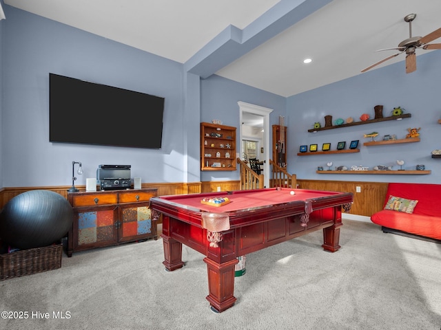 rec room with a wainscoted wall, billiards, a ceiling fan, and carpet floors