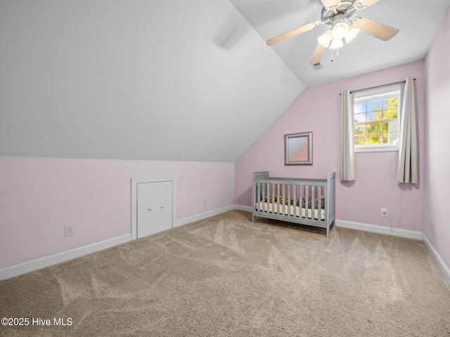 bonus room with lofted ceiling, baseboards, visible vents, and carpet floors