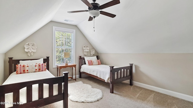 carpeted bedroom with lofted ceiling, visible vents, ceiling fan, and baseboards