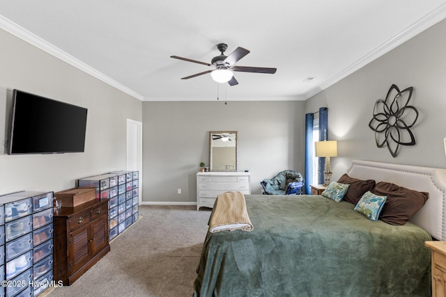 bedroom featuring a ceiling fan, crown molding, baseboards, and carpet floors