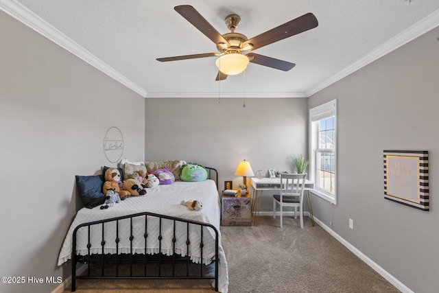 carpeted bedroom with ceiling fan, baseboards, a textured ceiling, and ornamental molding