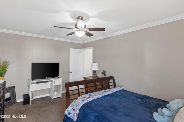 carpeted bedroom with ceiling fan, baseboards, and ornamental molding