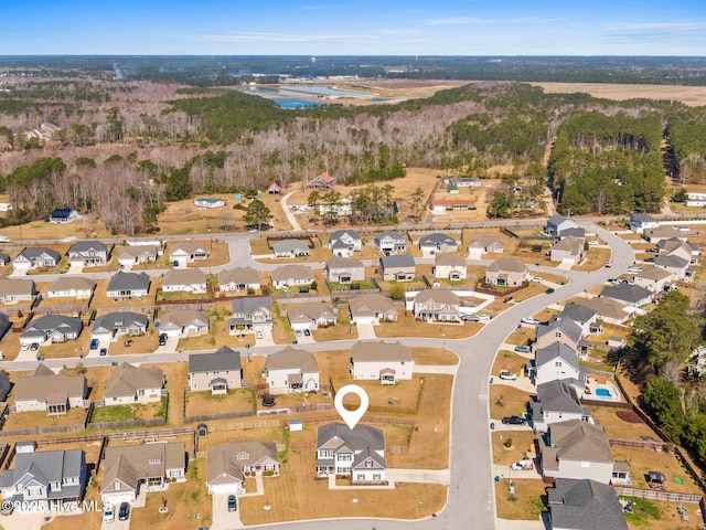 birds eye view of property with a residential view