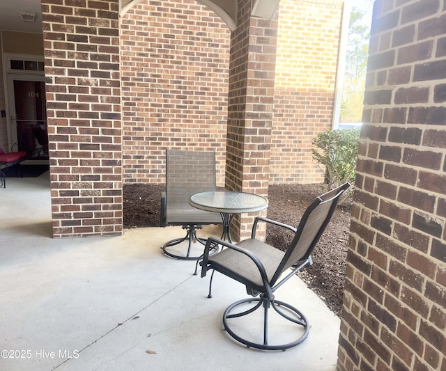 view of patio featuring visible vents