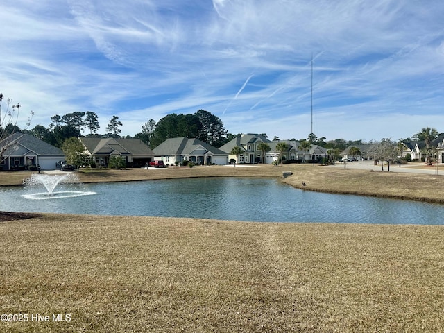 view of water feature with a residential view