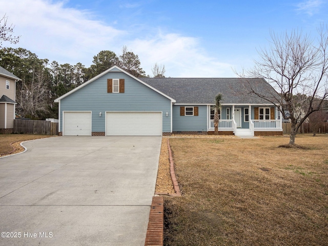 view of front of home featuring a porch, a garage, fence, concrete driveway, and a front lawn