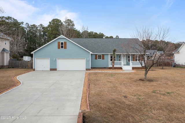 single story home with driveway, a garage, fence, a porch, and a front yard