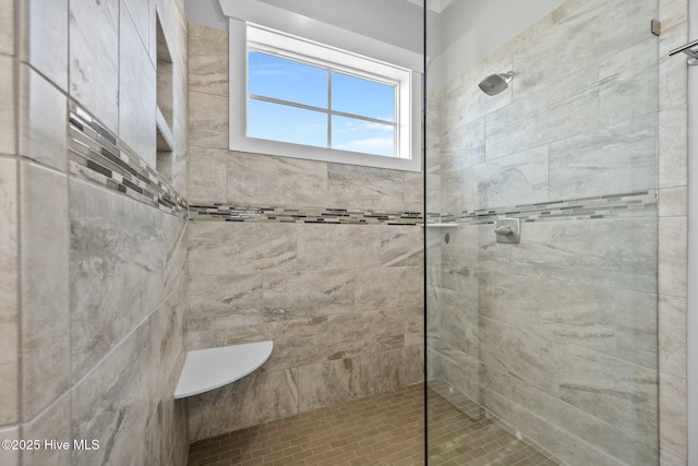 full bath featuring walk in shower