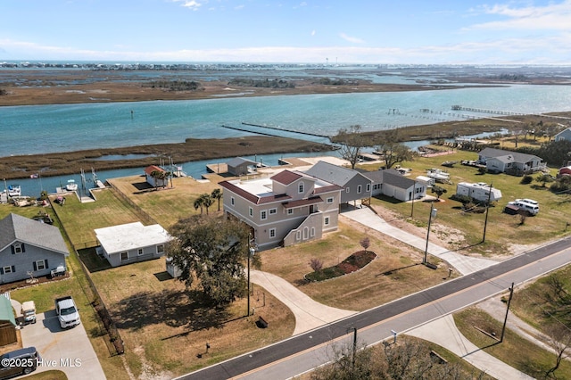 aerial view featuring a water view and a residential view