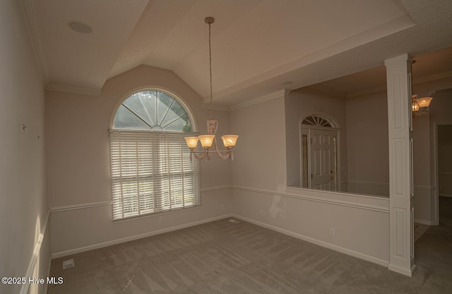 234 Crooked Gulley Cir, Sunset Beach, NC 28468 - unfurnished dining area with a chandelier, baseboards, lofted ceiling, carpet flooring, and ornamental molding