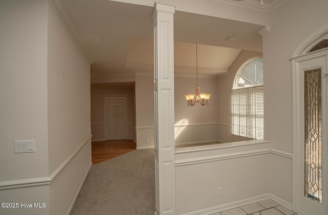 234 Crooked Gulley Cir, Sunset Beach, NC 28468 - hall featuring crown molding, a chandelier, and baseboards