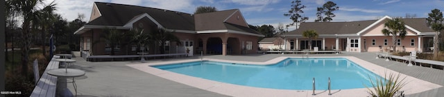 234 Crooked Gulley Cir, Sunset Beach, NC 28468 - community pool with a patio