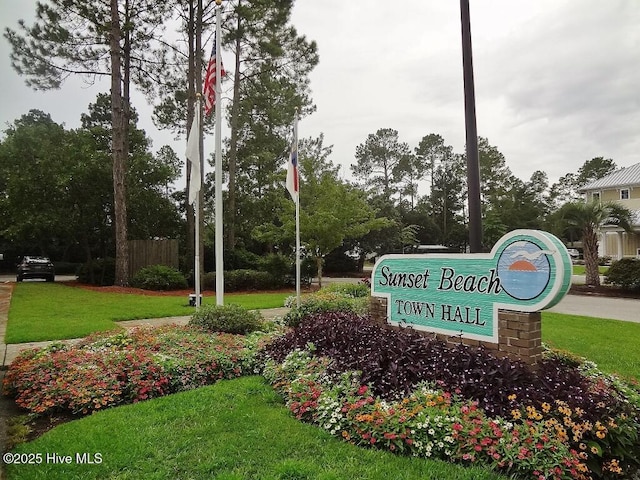 234 Crooked Gulley Cir, Sunset Beach, NC 28468 - community / neighborhood sign featuring a yard