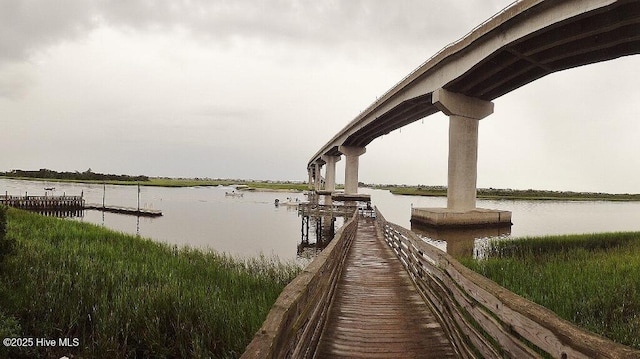 234 Crooked Gulley Cir, Sunset Beach, NC 28468 - dock featuring a water view