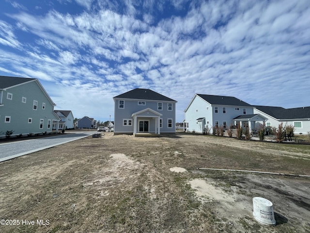 view of yard featuring a residential view