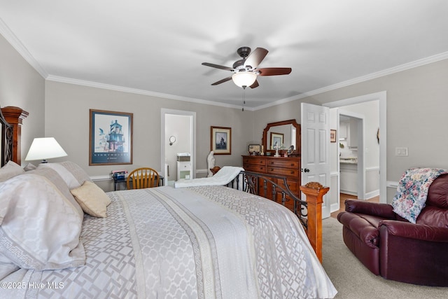 bedroom with ensuite bathroom, carpet flooring, a ceiling fan, and crown molding