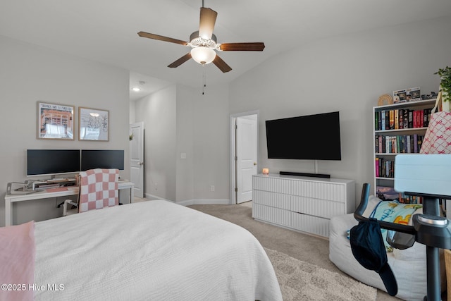 carpeted bedroom with a ceiling fan, lofted ceiling, and baseboards