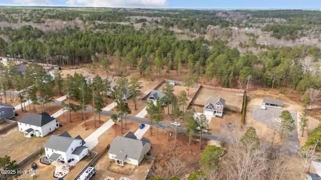 aerial view with a wooded view