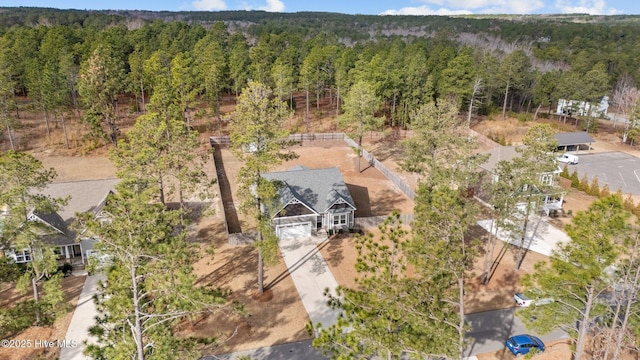 bird's eye view with a forest view