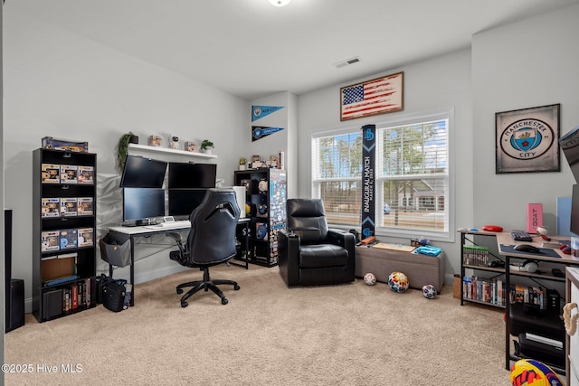 carpeted office featuring visible vents