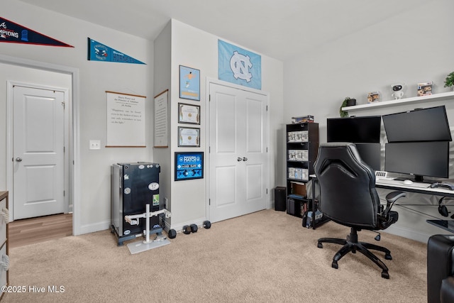 office space with carpet floors and baseboards