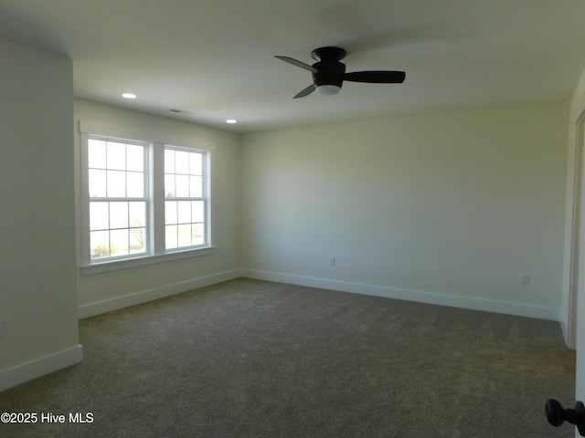 carpeted empty room with ceiling fan, baseboards, and recessed lighting