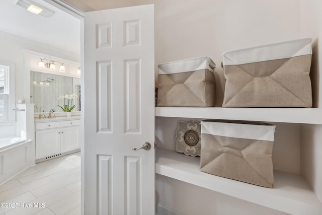 interior space featuring visible vents and a sink