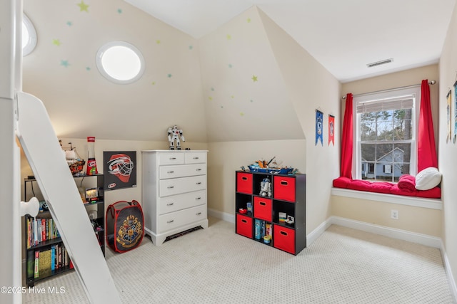 recreation room with lofted ceiling, baseboards, visible vents, and carpet floors