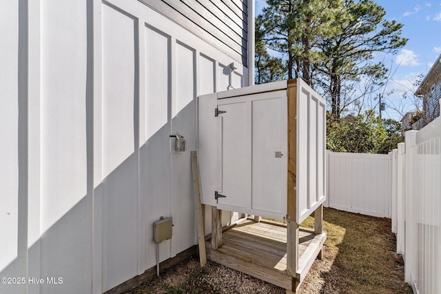 exterior space featuring an outbuilding and a fenced backyard