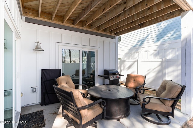 view of patio with a grill