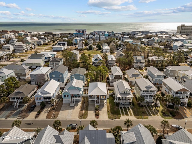 aerial view featuring a water view and a residential view