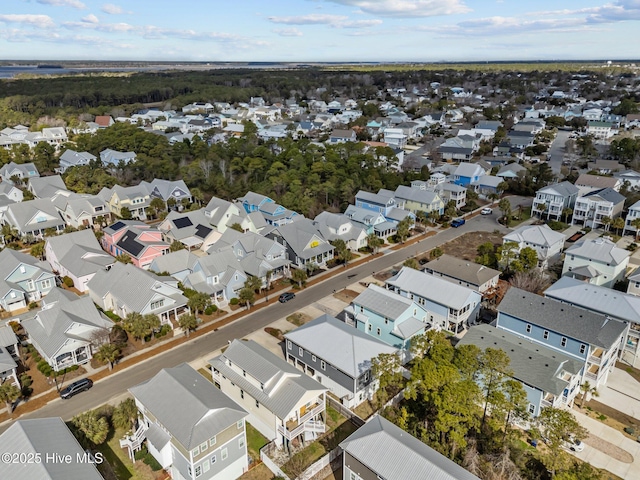 birds eye view of property with a residential view